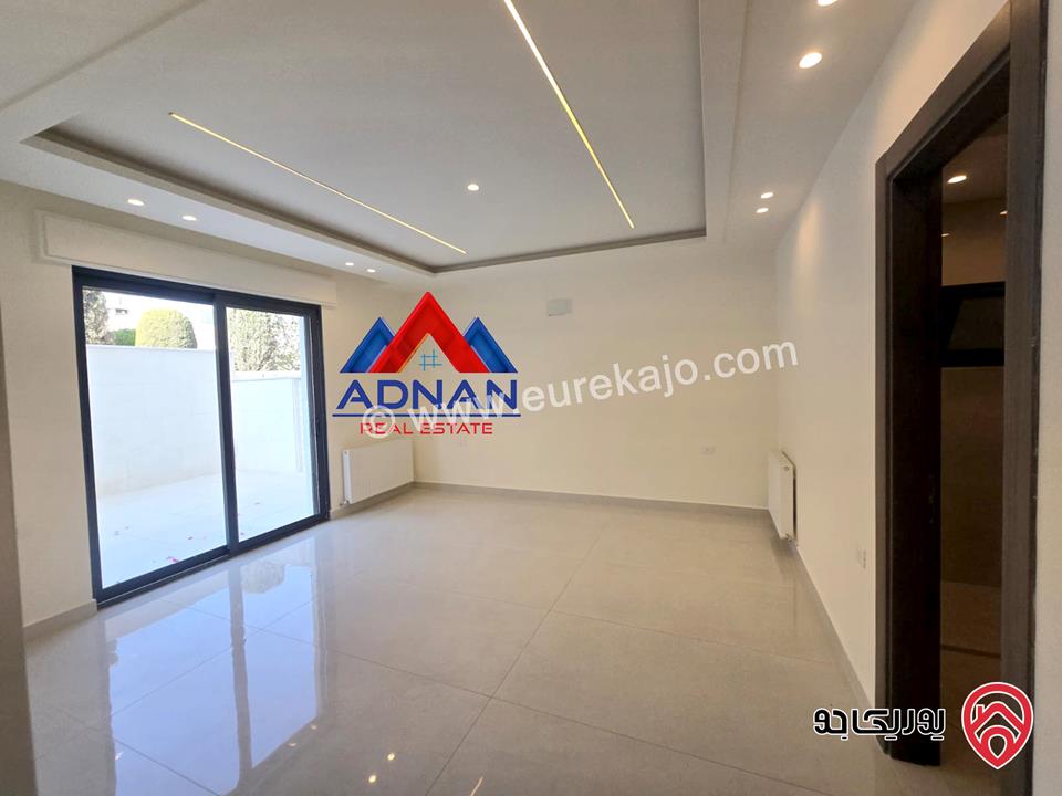 شقة أرضية مساحة 175م مع تراسات واسعة 200م و كراج ومدخل خاص للبيع في عمان - الرابية