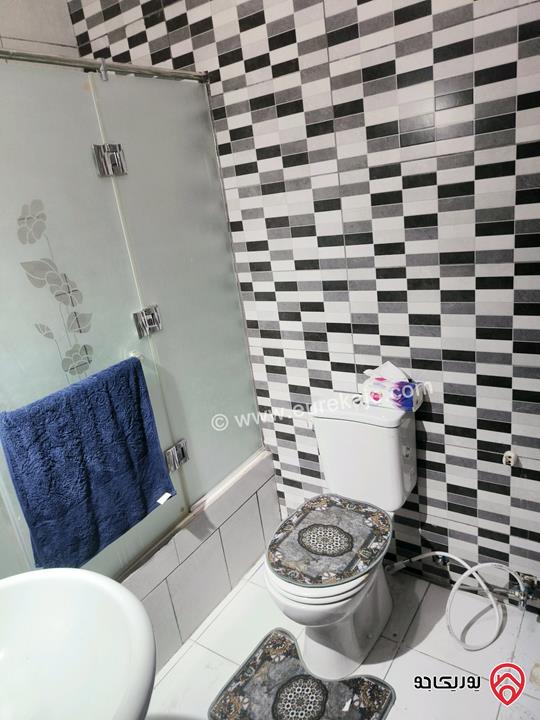 شقة طابق أرضي مساحة 173م مع ترس 60م مفروشة للبيع في عمان - الرابية