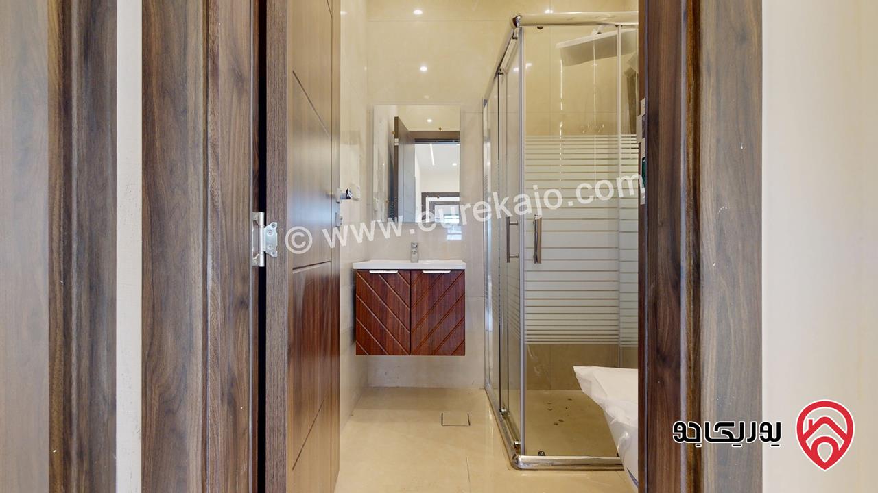 شقة طابق ارضي مساحة 155م داخلي و 50م خارجي للبيع في عمان - شفا بدران منطقة فلل