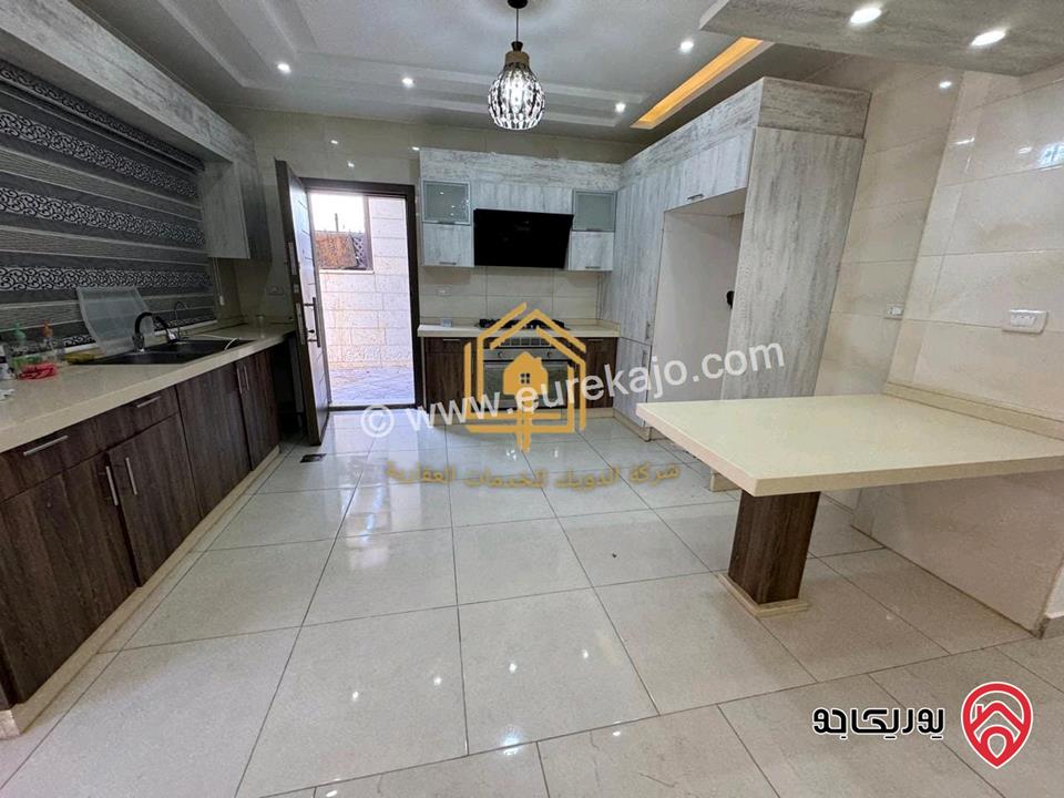 شقة سوبر ديلوكس طابق شبه ارضي مساحة 200م داخلي و 100م خارجي للايجار في عمان - طريق المطار 