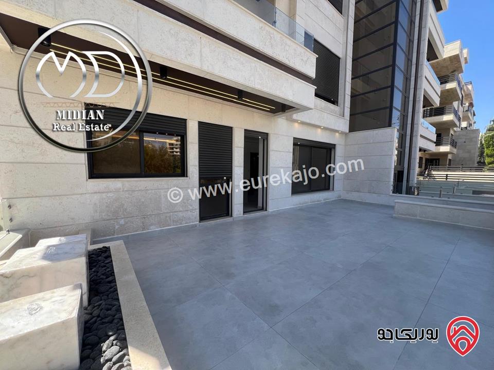 شقة ارضية جديدة للبيع في عمان - ضاحية النخيل مساحة 185م مع ترس 50م تشطيبات ديكورات فاخرة بسعر مميز