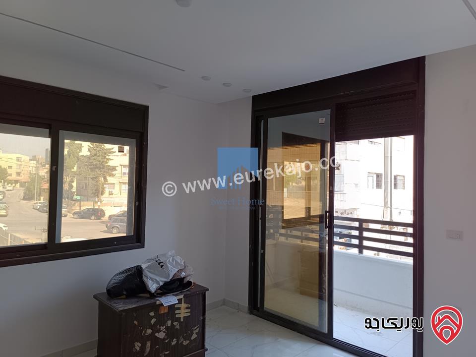 شقة فاخرة للبيع في عمان - الجندويل - قرب لارسا ومقابل شركة زين طابق اول 115م تشطيب سوبر ديلوكس لم تسكن