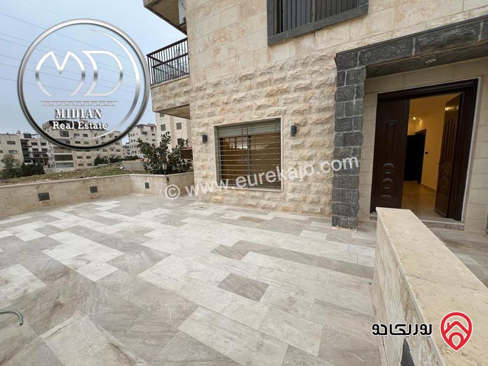 شقة ارضية للبيع في عمان - دير غبار مساحة 200م مع ترس 80م تشطيبات و ديكورات سوبر ديلوكس