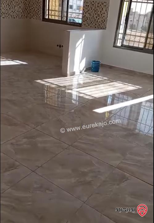 شقة ارضية مساحة 100م داخلي و 100م خارجي للبيع في عمان - الرابية