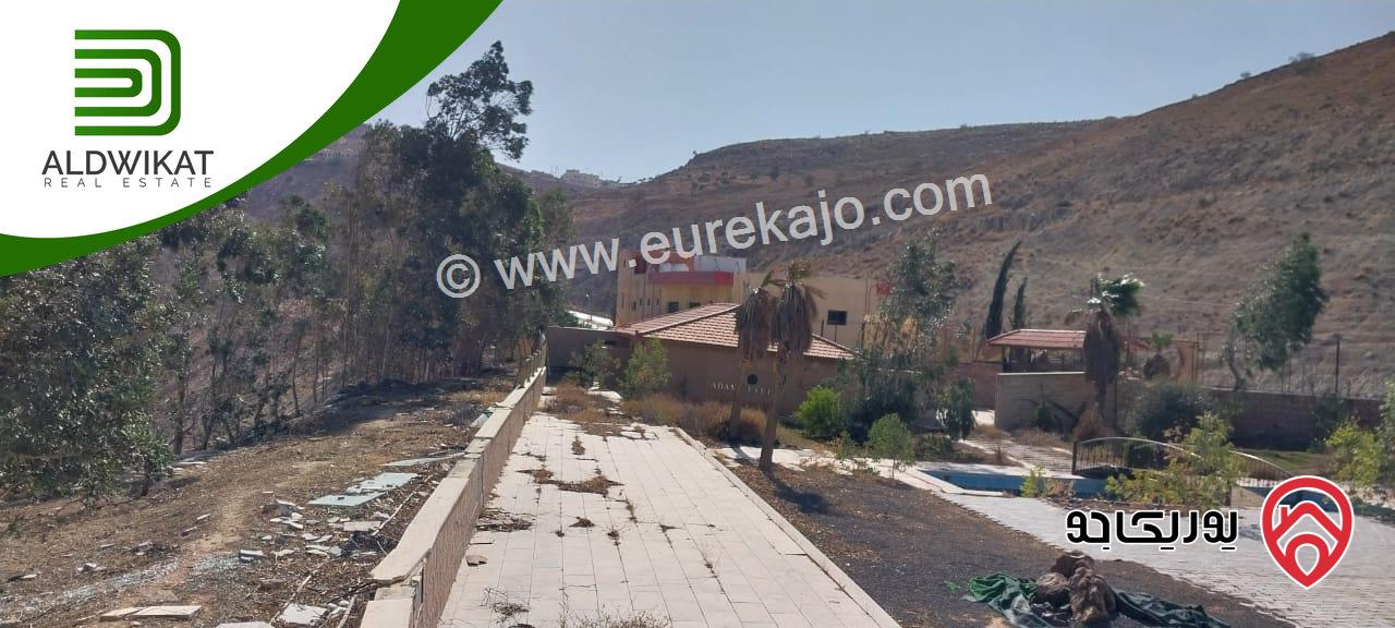 مشروع سياحي استثماري للبيع في ناعور / شارع البحر الميت مساحة الارض4650م والبناء 1000م موقع اطلالة مميز تصلح لمشروع استثماري