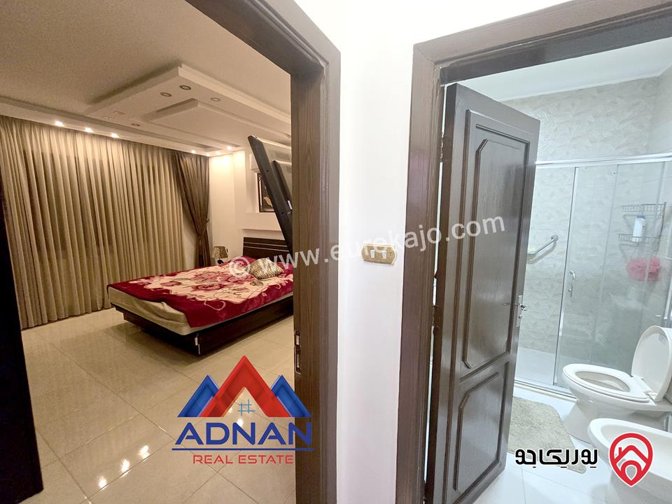 شقة أرضية مساحة 185م داخلي مع حديقة كبيرة 400م و كراج ومدخل خاص مفروشة للإيجار في عمان - الصويفية