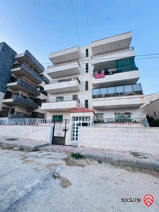 عمارة مكونة من 10 شقق مؤجرة للبيع في مادبا حنينا