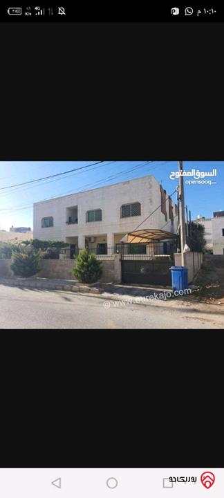 بيت مساحة الأرض 525م ومساحة البناء 444م طابقين للبيع في ابو علندا - إسكان الكهرباء
