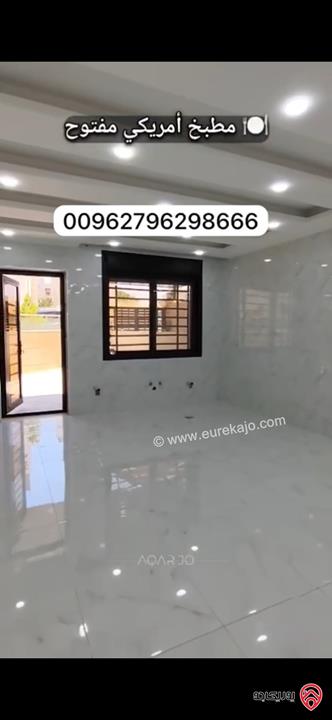 شقة فاخرة أرضية للبيع بسعر مغري في عمان - طريق المطار مساحة 183م + 130م وكراج مستقل وثلاث مداخل ماشاءالله