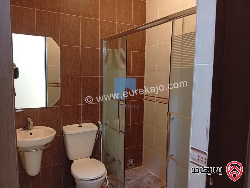 شقة أرضية مميزة مساحة 110م مع ترس 25م للبيع في عمان - الكرسي