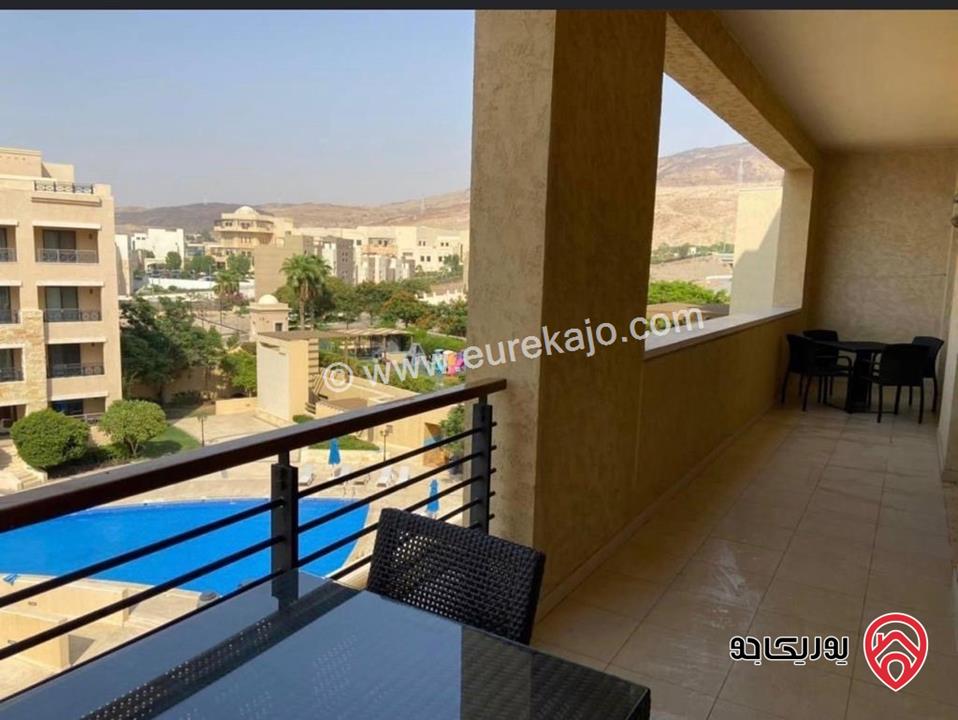 شقة مميزة مفروشة فرش كامل مساحة 155م مع اطلالة خلابة على البرك والبحر للبيع داخل منتجع سمارة البحر الميت