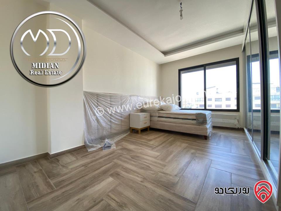 شقة دوبلكس جديدة فارغة للايجار في عمان - ضاحية النخيل طابق اخير مع روف مساحة 250م مع تراسات تشطيبات و ديكورات عصرية فاخرة