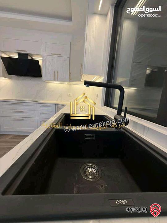 شقة جديدة دوبلكس ثالث مع روف مساحة 250م للإيجار في عمان - ضاحية النخيل 