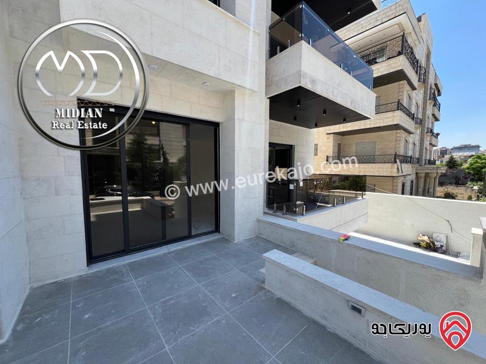 شقة ارضية جديدة للبيع في عمان - ضاحية الامير راشد مساحة 205م مع ترس 20م تشطيبات و ديكورات سوبر ديلوكس