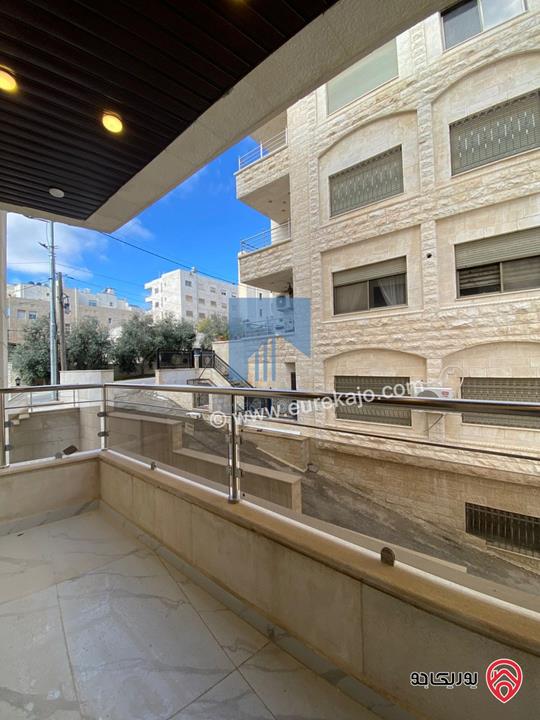 شقة فاخرة أرضية 184م مع ترس امامي 30م تشطيب سوبر ديلوكس لم تسكن للبيع في عمان - تلاع العلي