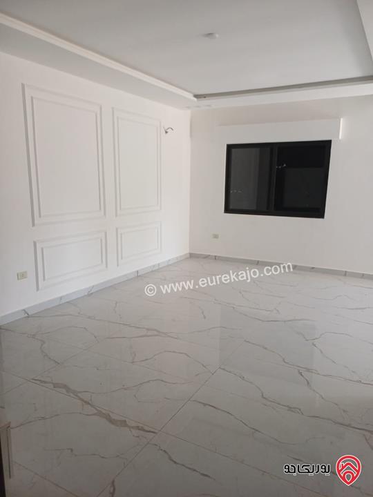 شقة مميزة تشطيب سوبر ديلوكس طابق ارضي مساحة 169م + ترس بناء جديد للبيع في عمان - المقابلين