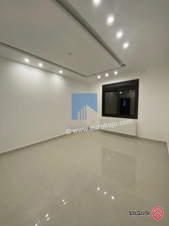 شقة أرضية فاخرة للبيع في عمان - الجندويل قرب المتصرفية 170م مع ترس 50م لم تسكن بسعر مغري