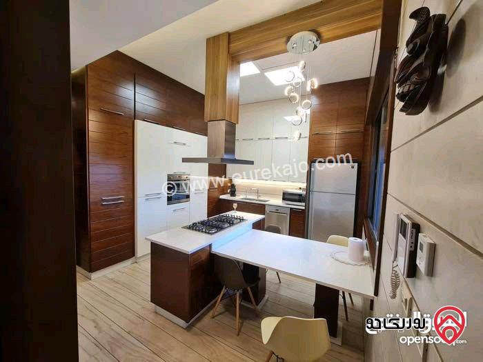 شقة طابقية ارضي معلق مساحة 226م داخلي و 180م خارجي بأطلالة للبيع في عمان - دابوق 