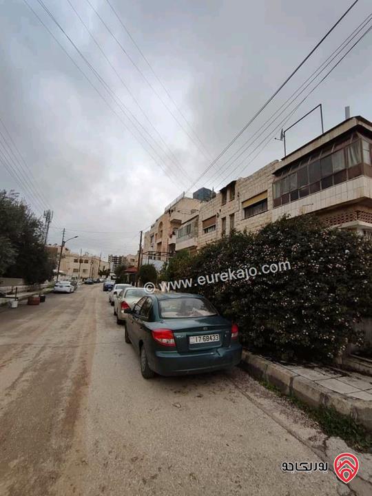 بناية سكنية وارض تحتوي على 4 شقق مقابل البوليفارد والعبدلي مول ومطلة على فندق اللاند مارك (هيلتون)  بمنطقة ممتازة للاستثمار للبيع في عمان - العبدلي