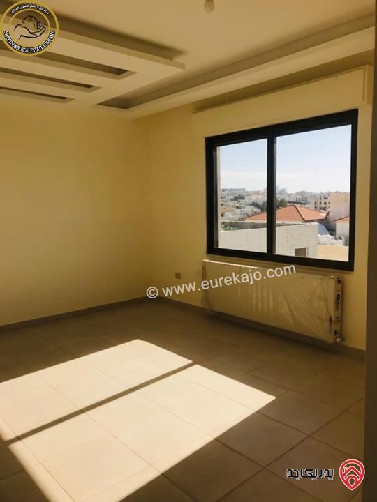 شقة فاخرة للبيع في عمان - خلدا - العوجانية قرب الهمشري طابق ثالث 200م مع روف دوبلكس 140م لم تسكن