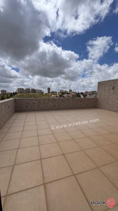 شقة طابق اخير مساحة 187م مع رووف منفصل 48م وترس 110م للبيع في عمان - مرج الحمام