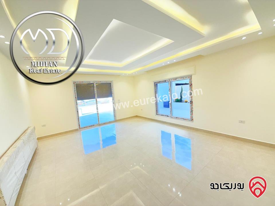 شقة ارضية للبيع في عمان - خلدا مساحة 180م مع ترس وحديقة 200م تشطيبات ديكورات عصرية فاخرة جديدة لم تسكن