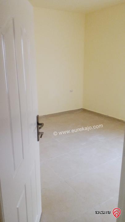 شقة طابق أول مساحة 128م للبيع في عمان - الجبل الأخضر حي نزال الشمالي 