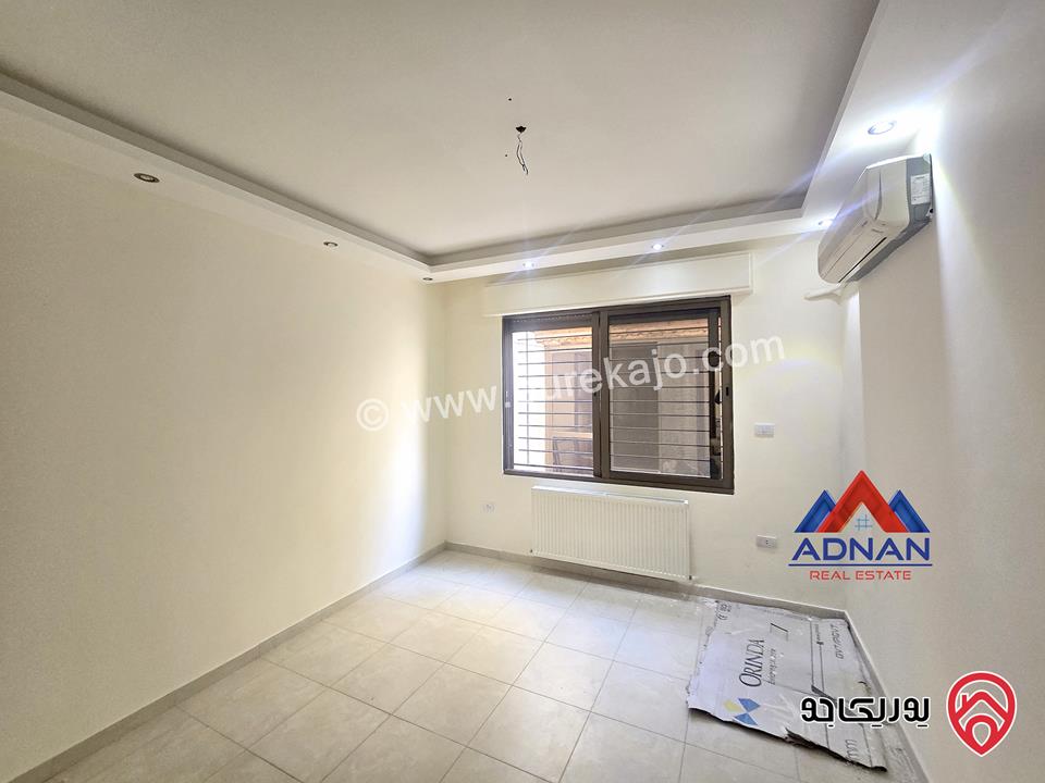 شقة شبه ارضي مساحة 140م داخلي و 130م خارجي للإيجار الفارغ في عمان - الرابية