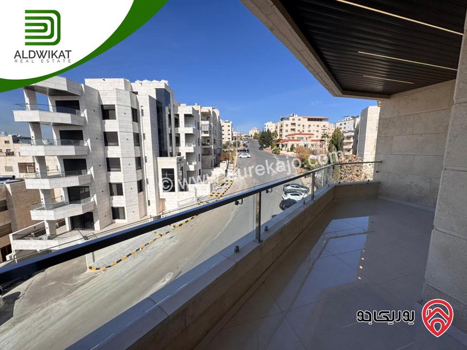 شقة طابقية مع روف للبيع في عمان - تلاع العلي مساحة البناء 260م ومساحة الترس 70م على شارعين