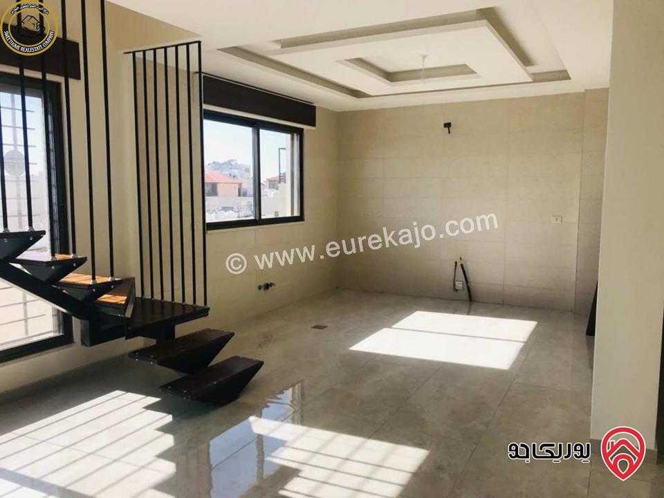 شقة فاخرة للبيع في عمان - خلدا - العوجانية قرب الهمشري طابق ثالث 200م مع روف دوبلكس 140م لم تسكن