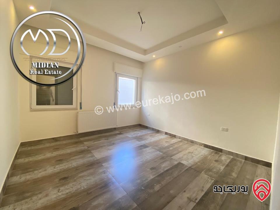 شقة أرضية للبيع في عمان - خلدا مساحة 185م مع ترس 40م تشطيبات سوبر ديلوكس جديدة لم تسكن بسعر مميز