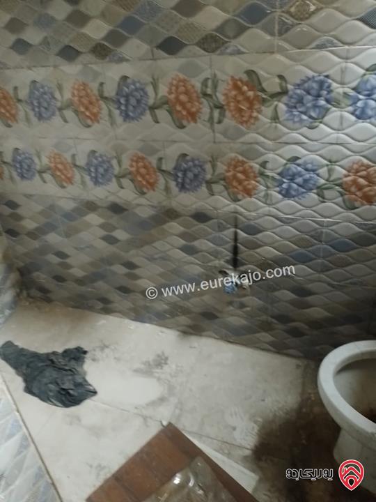 عمارة على قطعة ارض مساحة 250م للبيع في عمان - منطقة الوحدات