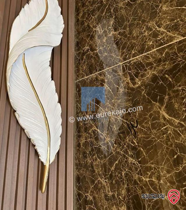 شقة أرضية فاخرة للبيع في عمان - تلاع العلي - خلف طواحين الهوا 180م مع ترس 40م لم تسكن