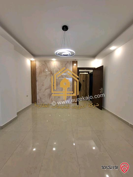 شقة جديدة طابق أرضي مع حديقة مساحه 150م داخلي 130م حديقة للايجار في عمان - الجندويل 