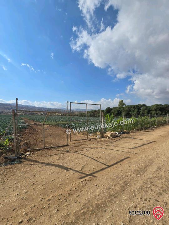 قطعة ارض ومشروع استثماري ناجح مساحة 24 دونم و 309م للبيع من اراضي شمال عمان - موبص تبعد عن شارع الاردن موقع قصر الجبل دقيقتين حوض سنينة الماء  