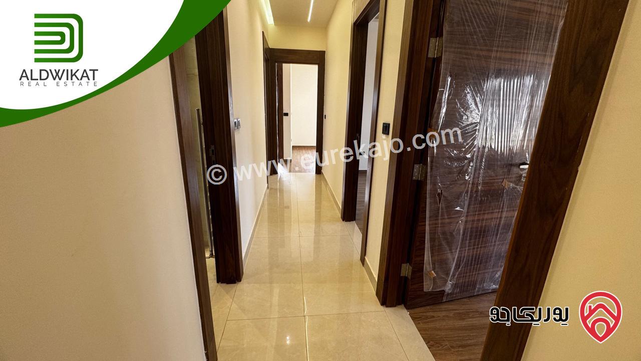 شقة ارضية للبيع في عمان - خلدا مساحة البناء 250 م والترس 80م موقع مميز واطلالة