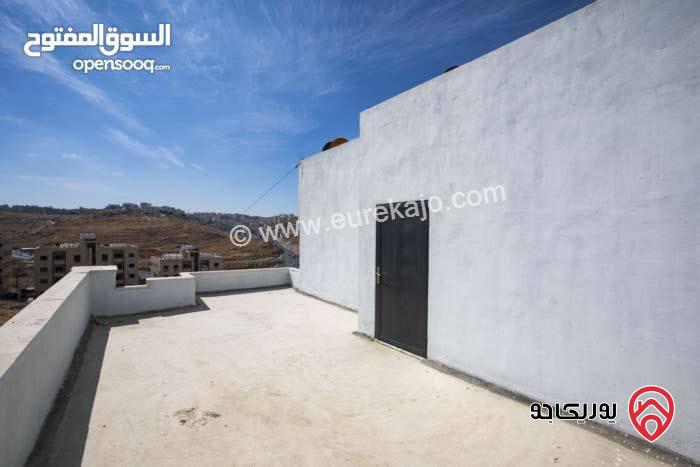 اخر شقة في المشروع طابق ثالث مع روف مبني مرخص مساحة 135م للبيع في عمان - ابو علندا 