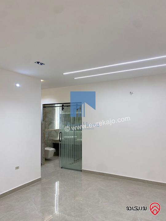 شقة أرضية فاخرة للبيع في عمان - أم أذينة قرب أبراج السادس 200م مع ترس 60م لم تسكن