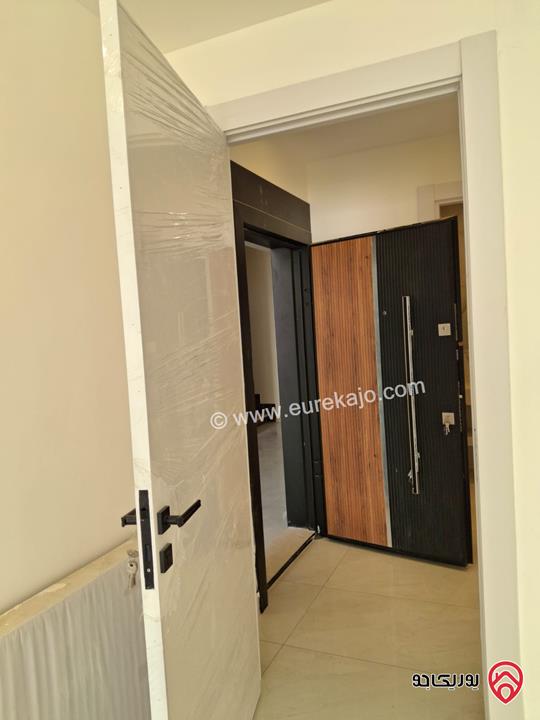 شقة جديدة طابق أول مساحة 175م للبيع في عمان - الرابية