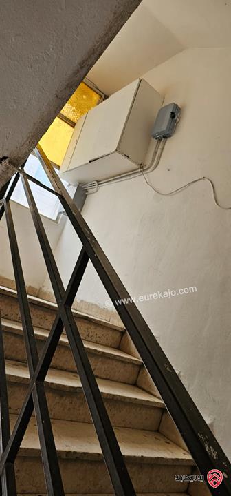 عمارة على أرض 455م للبيع في الزرقاء - حي الإسكان 