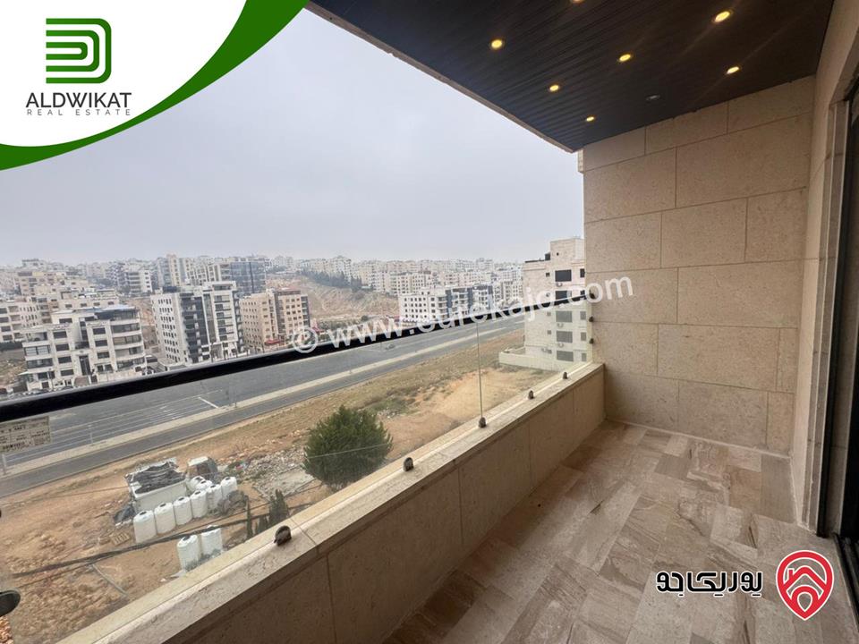 شقة طابق اول طابقية للبيع في عمان - على طريق المطار / حجار النوابلسه مساحة البناء 200م موقع اسكانات حديثة واطلالة