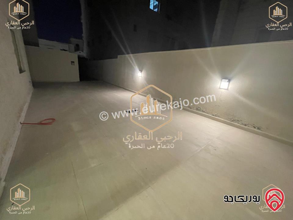 شقة ديلوكس شبه ارضية مساحة 90م مع ترس 50م للايجار في عمان - الجندويل 