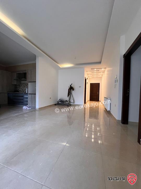 شقة شبه ارضية مساحة 110م للايجار في عمان - خلدا