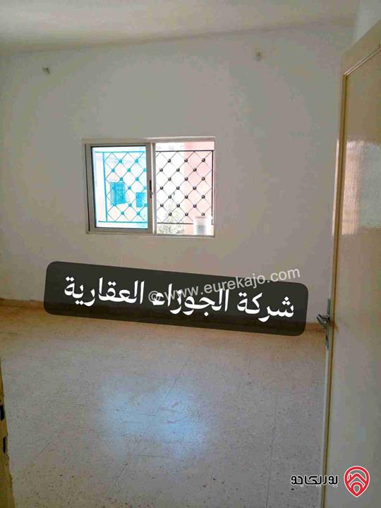 شقة فارغة مساحة 100م طابق ثاني للايجار في عمان - حي نزال شارع الدستور 