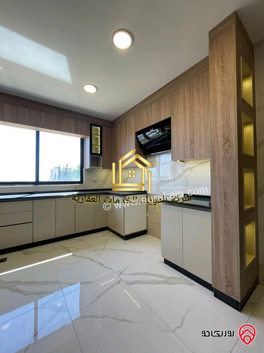 شقة جديدة لم تسكن مساحة 190م طابق أرضي معلق للايجار في عمان - دابوق 