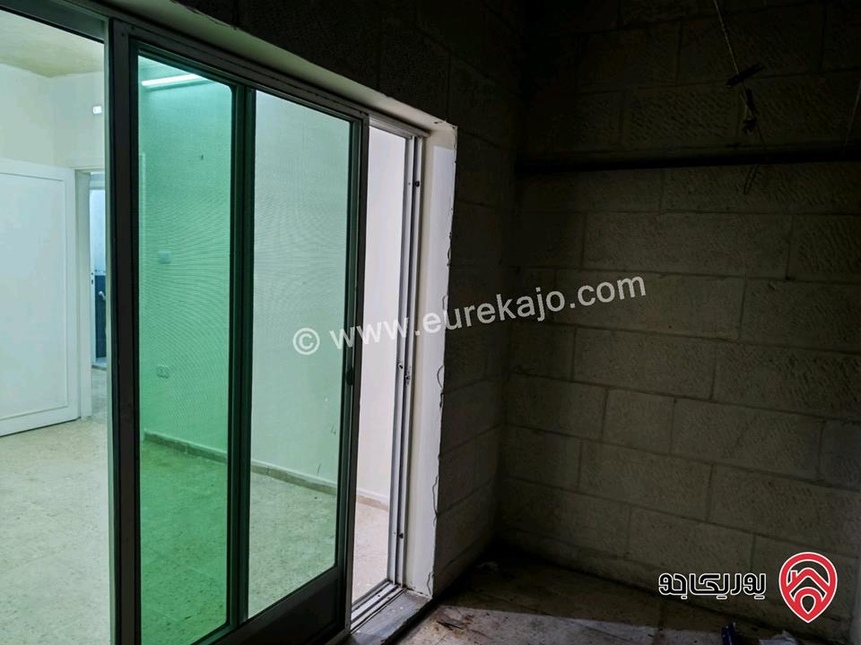 شقة طابق أول مساحة 87م للايجار في اربد غرب نفق الجامعة 