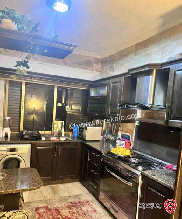 شقة طابق أول مساحة 105م للبيع في عمان - البنيات