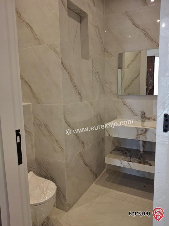 شقة جديدة طابق أول مساحة 175م للبيع في عمان - الرابية