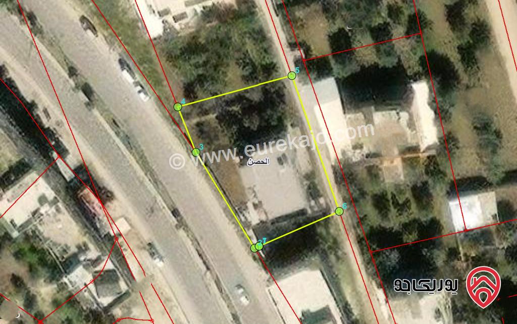 قطعة ارض تجارية مساحة 1015م للبيع في اربد على طريق اربد الحصن مباشرة