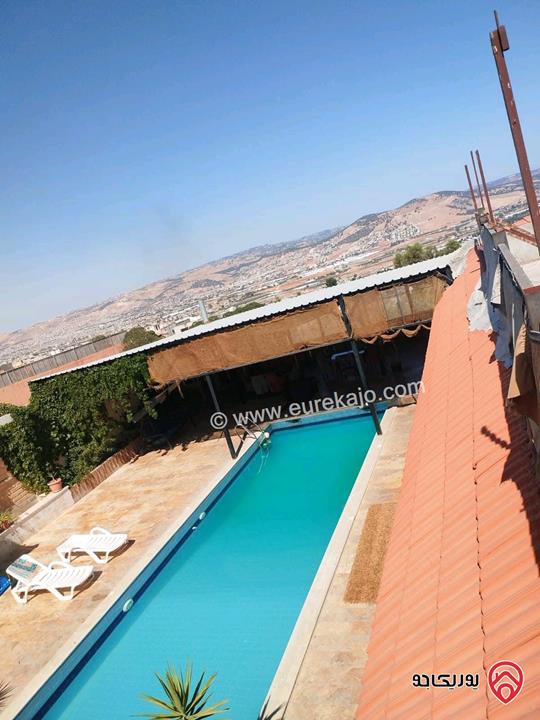 مزرعة مساحة الأرض 2 دونم و 500م والبناء 250م للبيع من أراضي شمال عمان - موبص